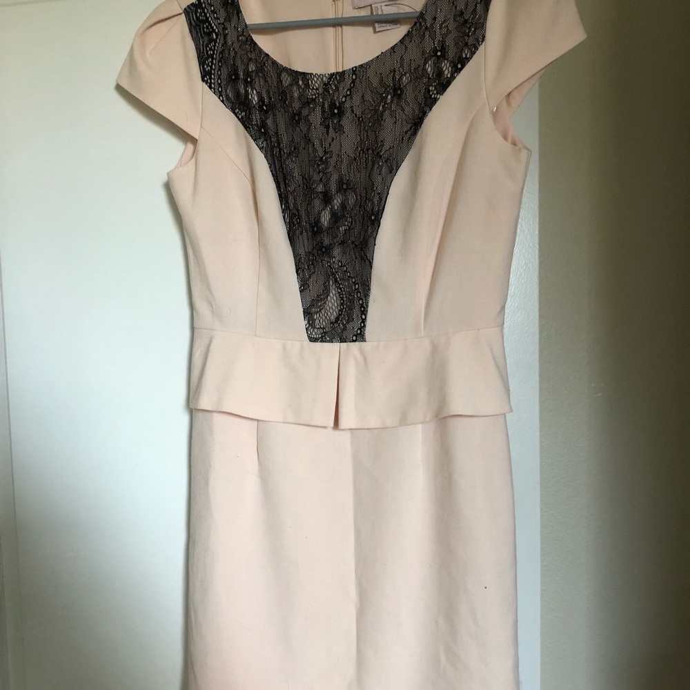 Nude dress perfect for casual interviews.